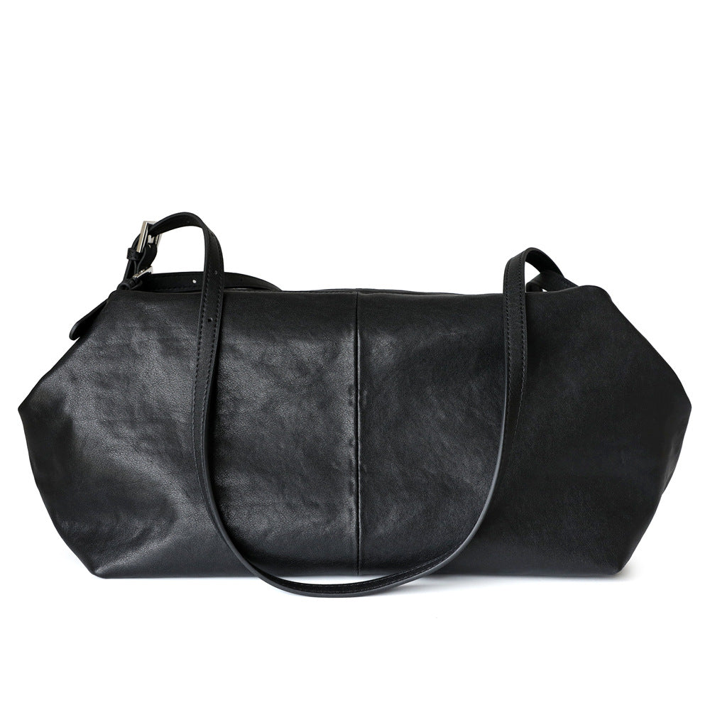 Grand sac unisex en cuir de vachette tanné végétal, taille petits et grands, coloris noir, vue frontale