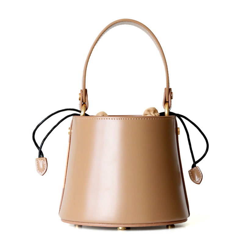 Mini sac seau femme en cuir véritable, coloris beige, vue frontale