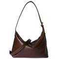 Sac à main simple en cuir tanné végétal, coloris café, vue frontale.