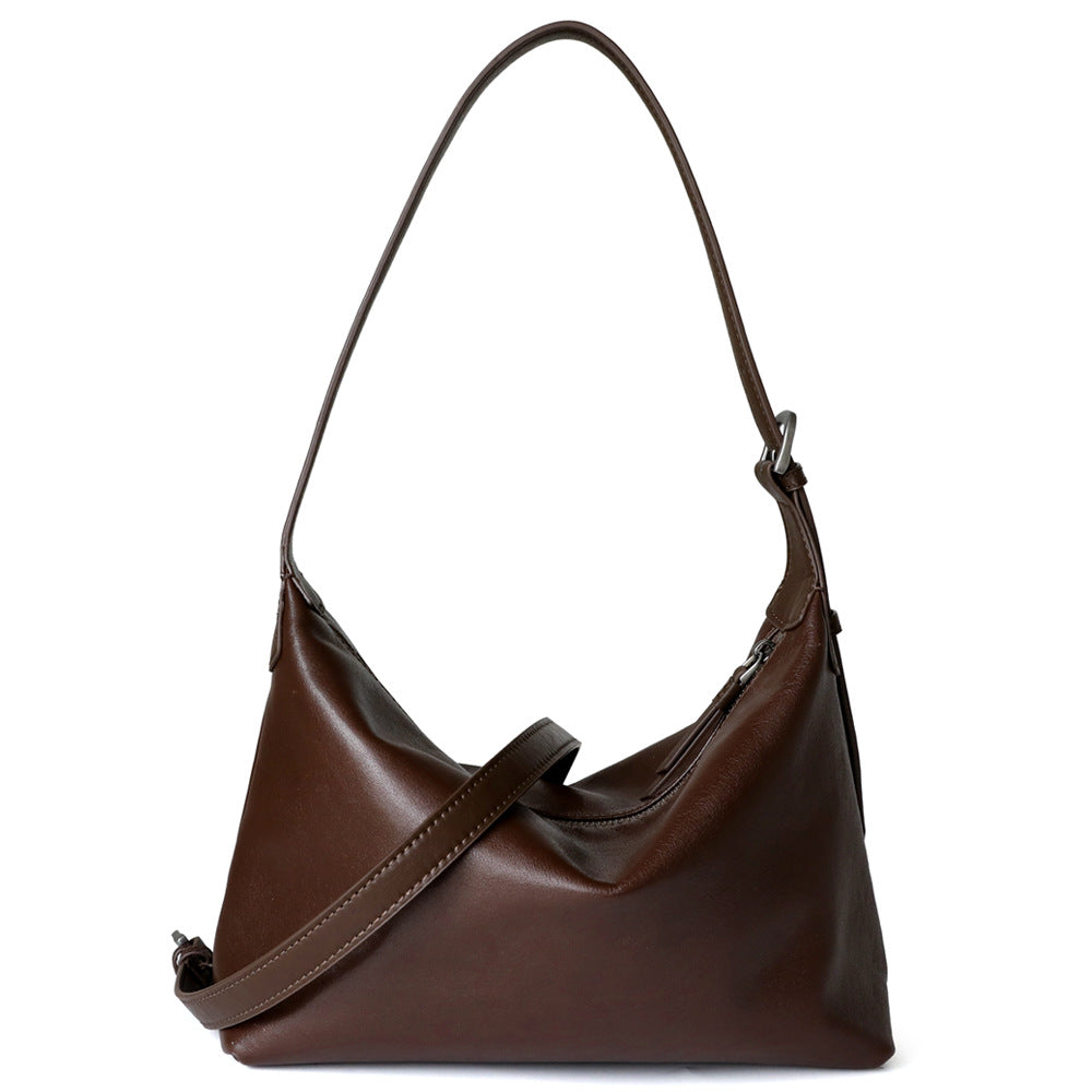Sac à main simple en cuir tanné végétal, coloris café, vue frontale.