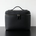 Trousse de maquillage en cuir de vachette pleine fleur, coloris noir ,  vue frontale