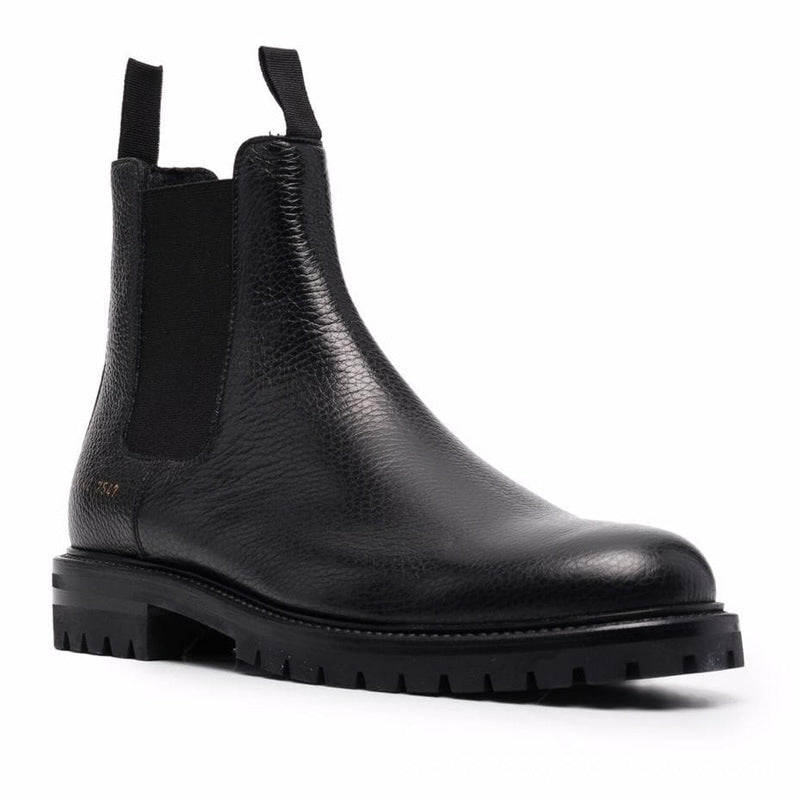 bottes chelsea noir en cuir véritable avec un bout rond et talon bas, vue latéral de l'avant