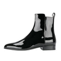  bottines zippées  à cheville en cuir noir verni à bout pointu et talon bas, vue de coté